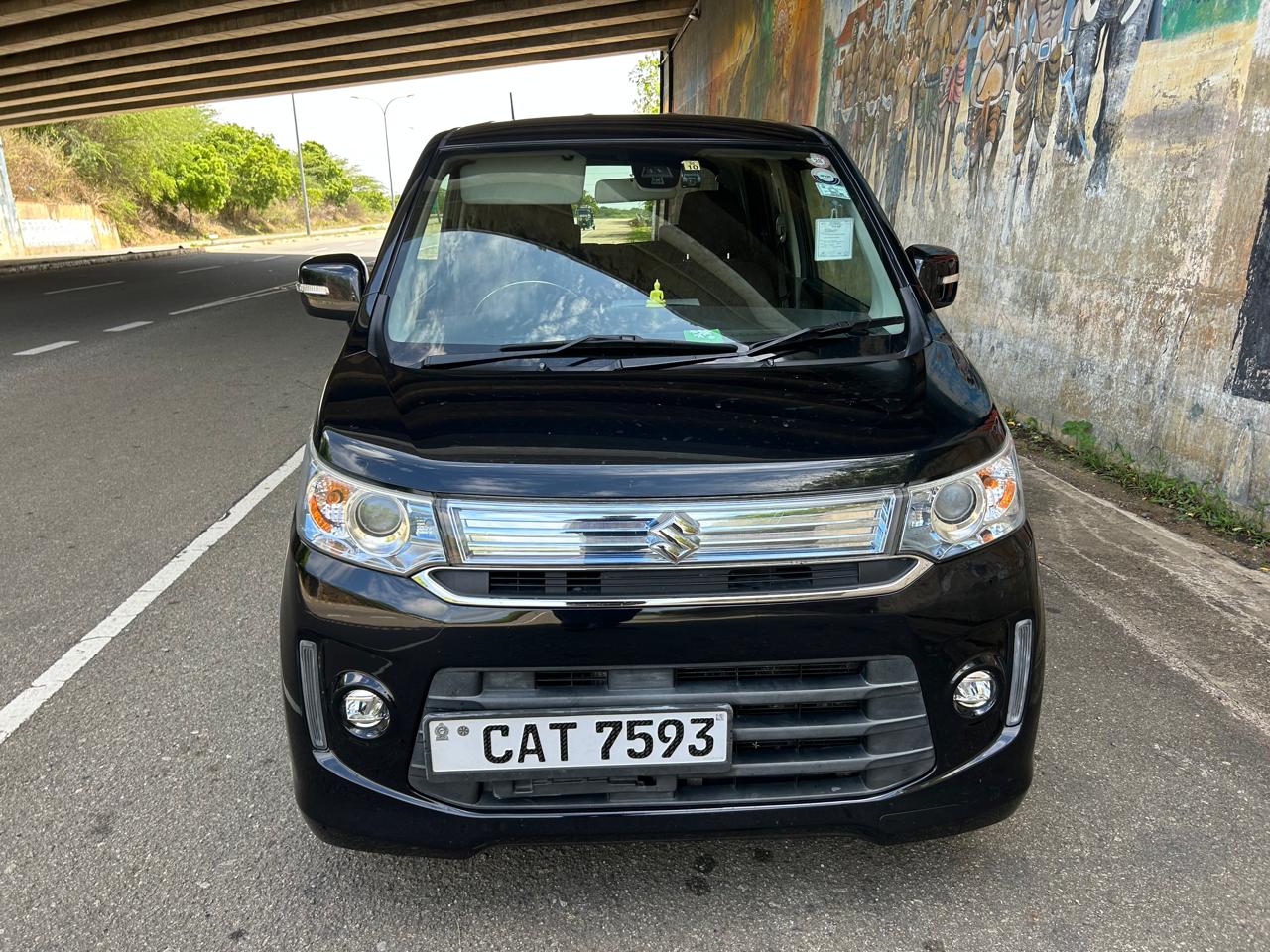 Suzuki Wagon R Stingray front view — Lotus Tours city vehicle